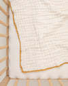 undyed gold organic cotton gauze lace baby blanket