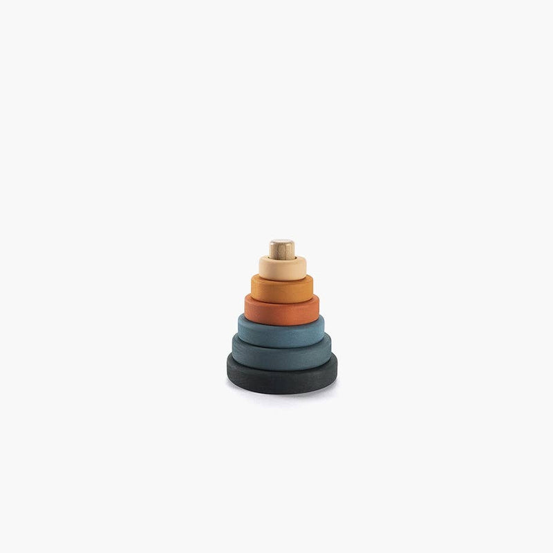 Stack of colorful wooden rings on a white background