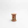 Wooden hourglass-shaped object on a white background