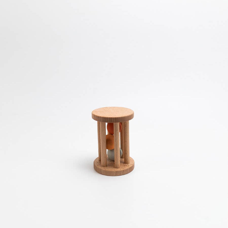 Wooden hourglass-shaped object on a white background
