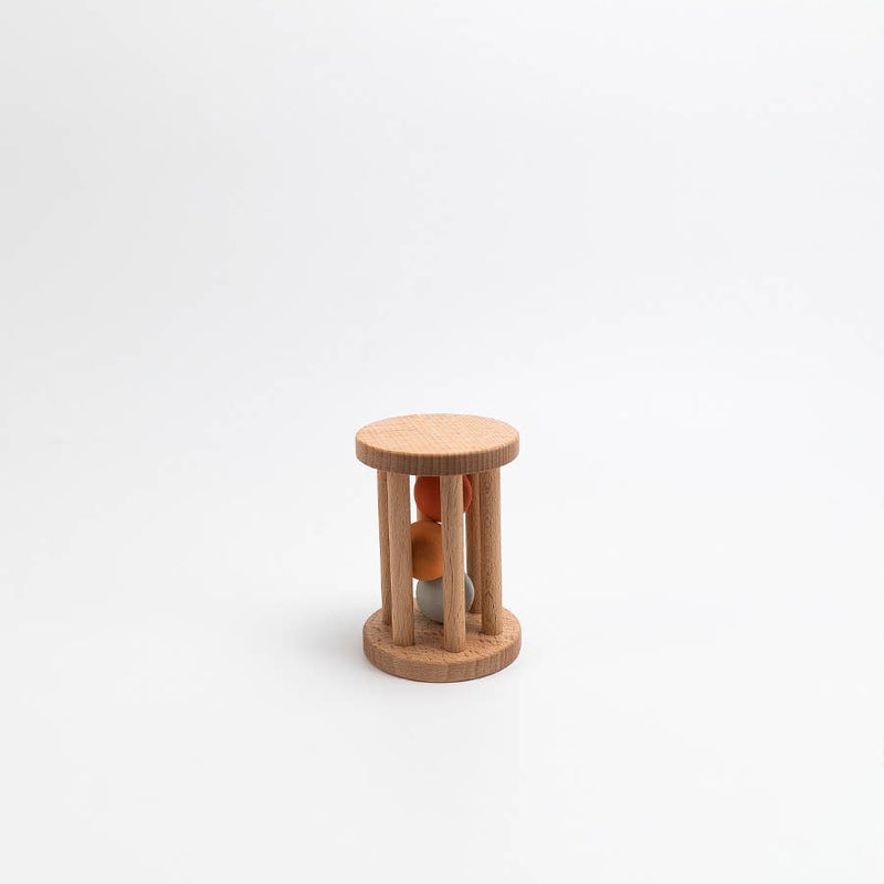 Wooden hourglass-shaped object on a white background