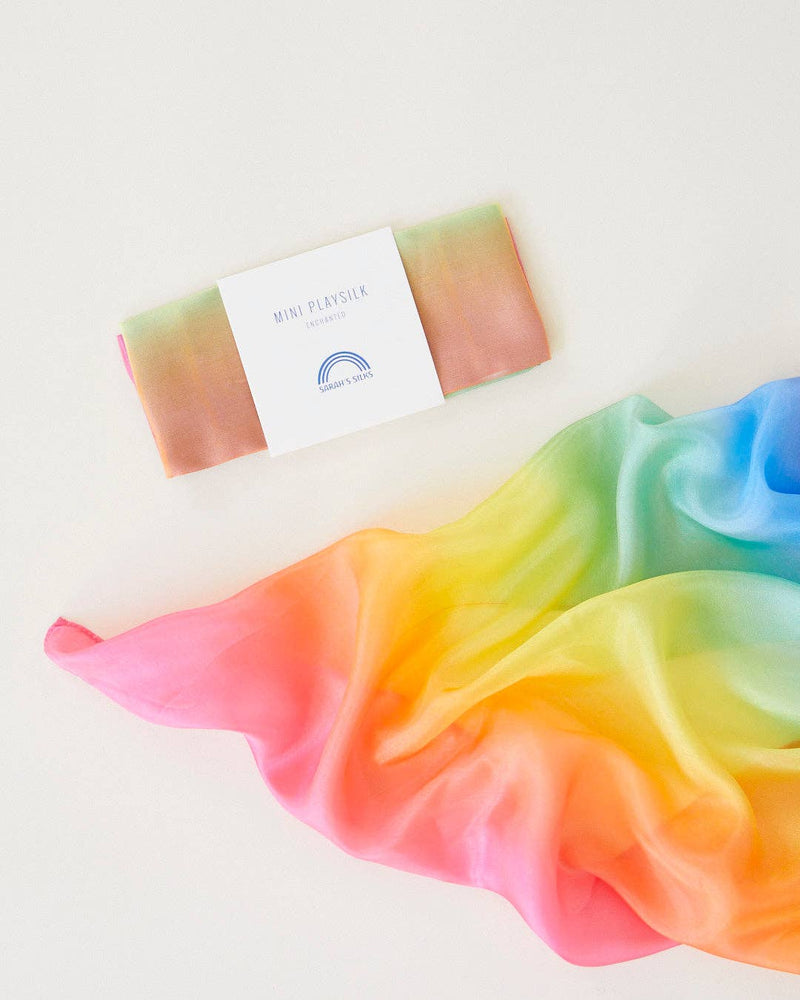 Colorful tie-dye fabric with a box labeled 'Rainbow' on a white background