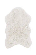 White fluffy sheep rug on a white background