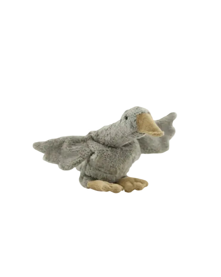 Plush toy duck on a white background