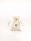 Beige drawstring bag with 'sabo' branding on a white background