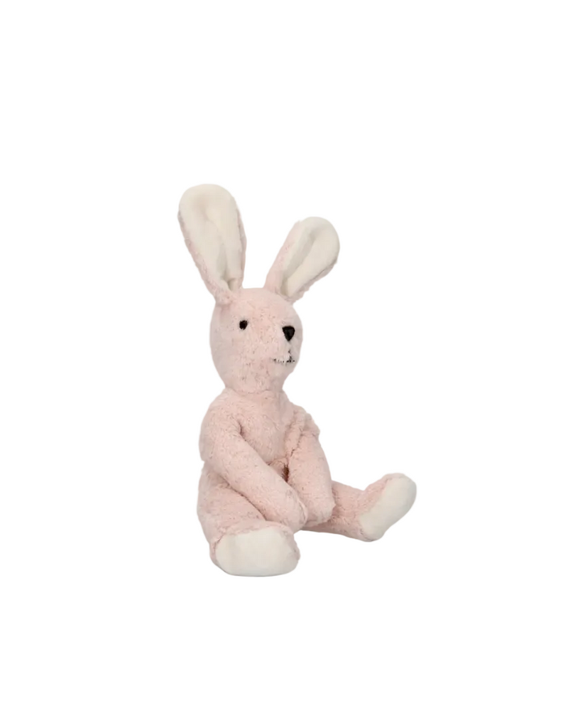 Pink plush bunny toy on a white background