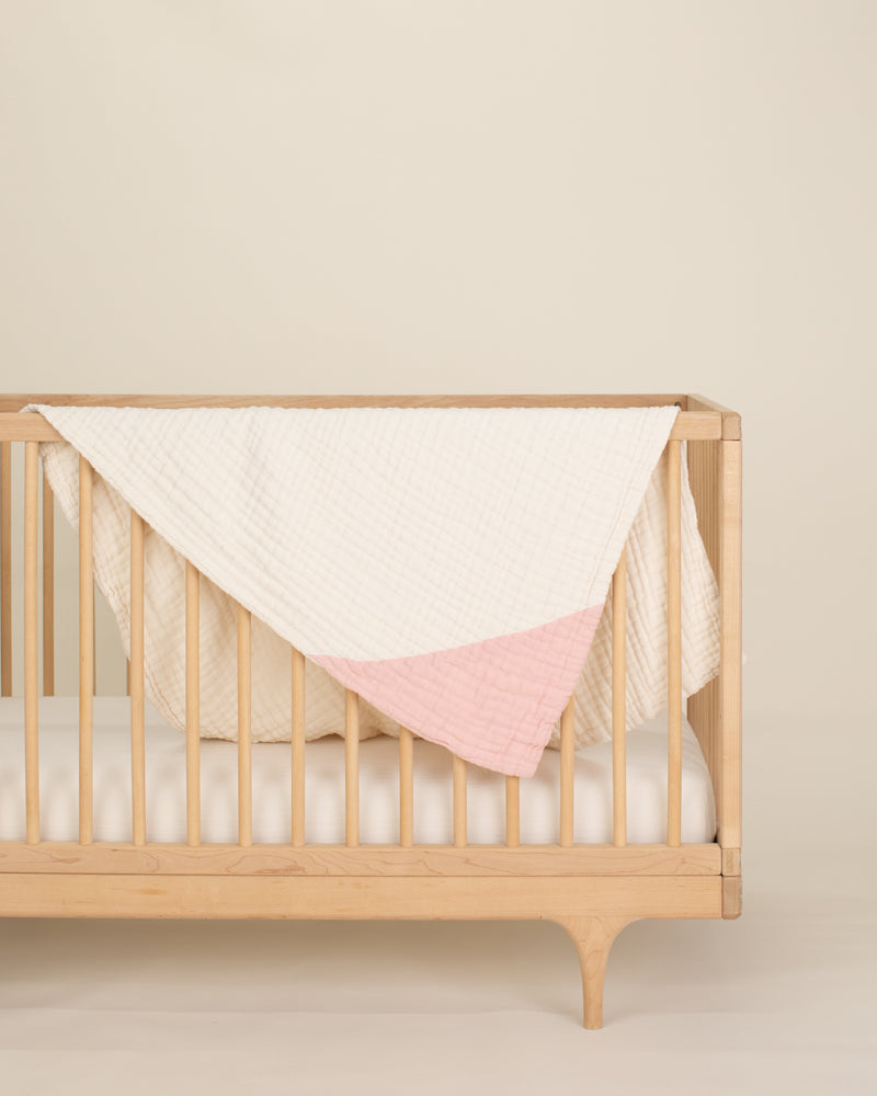 light pink gotscertified undyed organic cotton gauze geo baby blanket