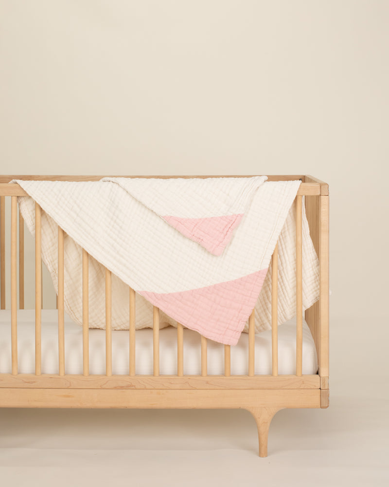 light pink organic cotton gauze burp cloth and geo baby blanket set
