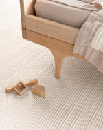 hand-loomed rug / ivory