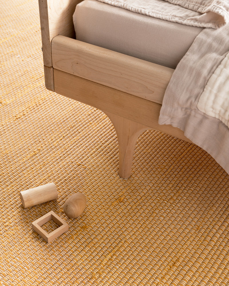 hand-loomed rug / goldenrod